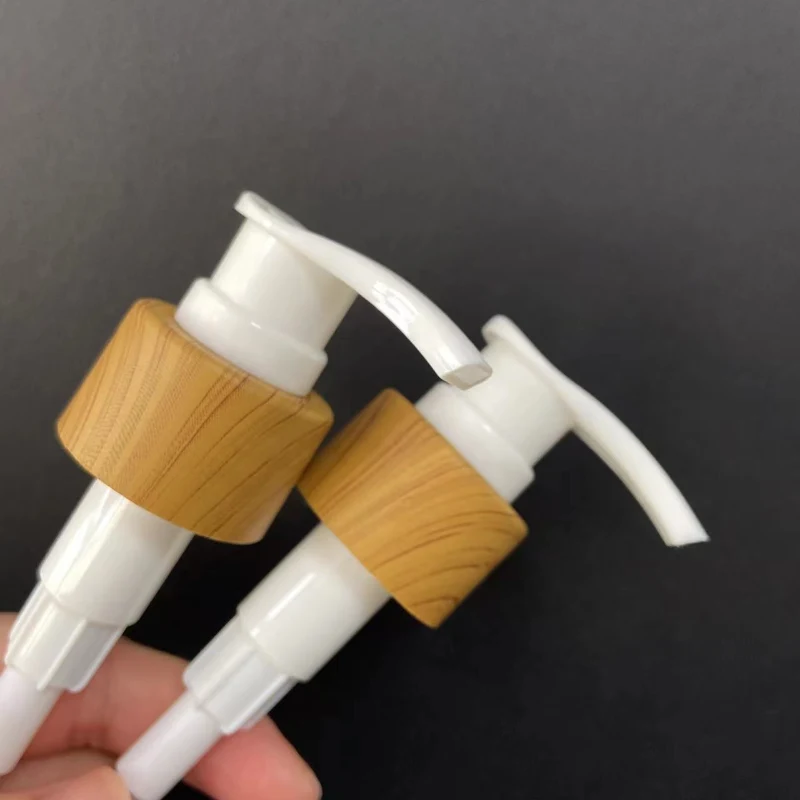 Factory Personal Care Non Spill 24/410 Water Transfer Printing PP Lotion Pump with Wood Grain Pattern 